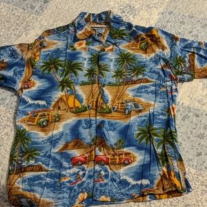 Tropical print button up shirt.